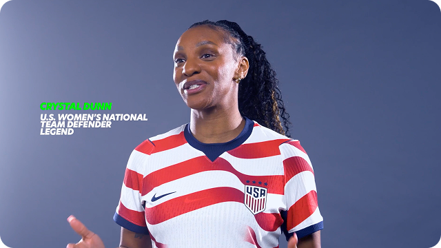 Former U.S. Soccer player Crystal Dunn is directly addressing the camera. An overlay with a play video button appears in the corner.